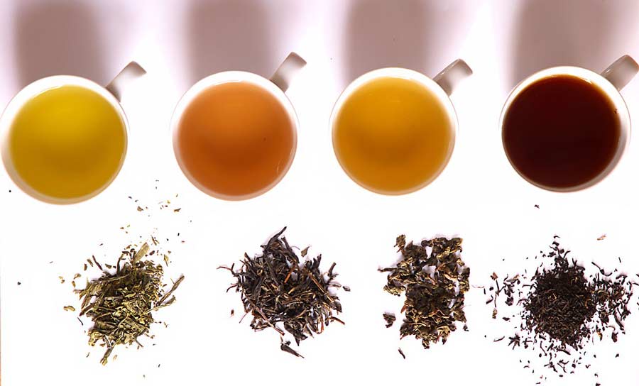 Image of four types of tea, loose-leaf and brewed